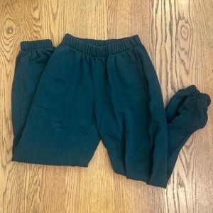 dark green sweatpants